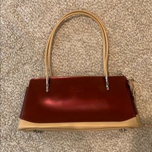 Beijo red and tan purse